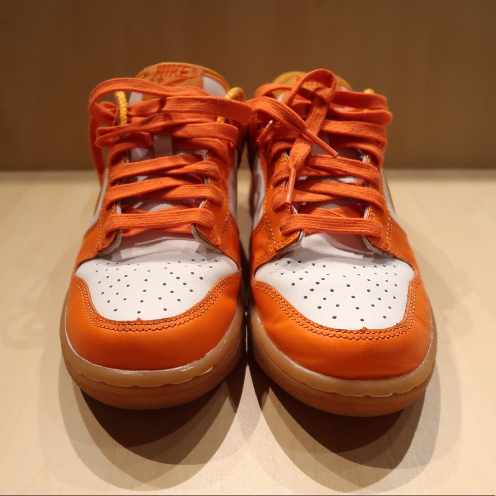 Bright orange Nike dunk low sneakers